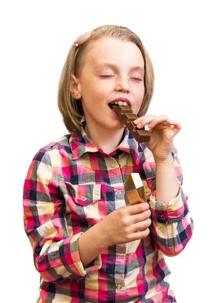 Enfant manger des barres de chocolat — Photo