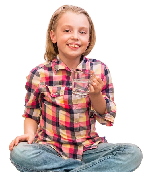 Cheerful child drinking mineral water. — Stock Photo, Image