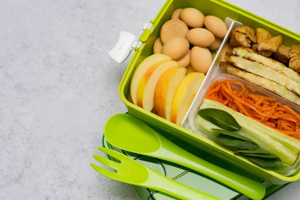 Lunch Box Green Cutlery Snack Chicken Cucumbers Carrots Spinach Leaves — Stock Photo, Image