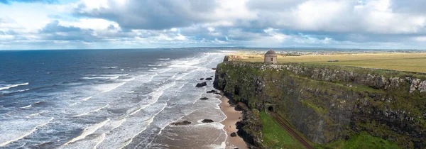 Aerial view of cliffs and sea at Downhill beach in County Londonderry in Northern Ireland — Stock Photo, Image