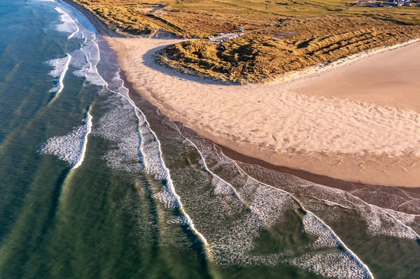 Aerial of the Beautiful Blue Flag Beach, Killahoey Strand near Dunfanaghy, Donegal, Ireland