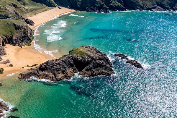 Aerial view of the Murder Hole beach, officially called Boyeghether Bay in County Donegal, Ireland.