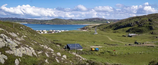 The camping site next to Murder Hole beach, officially called Boyeeghether Bay starts at the camping site County Donegal, Ireland.