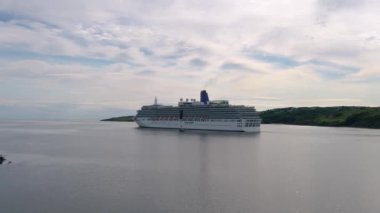 KILLYBEGS, IRELAND - JULY 22 2022: MS Arcadia is a cruise ship in the P and O Cruises fleet leaving after visiting Killybegs the first time.