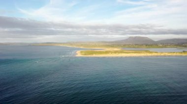 Machaire Rabhartaigh, Translation: Magheraroarty - Plane of the spring tideplane of roarty, Gaeltacht village and townland in north-west of County Donegal, Ireland