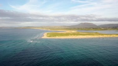 Machaire Rabhartaigh, Translation: Magheraroarty - Plane of the spring tideplane of roarty, Gaeltacht village and townland in north-west of County Donegal, Ireland
