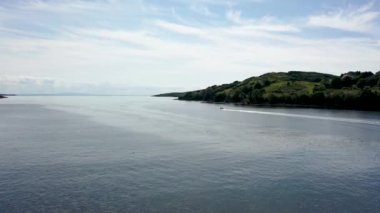 Fast boat leaving Killybegs harbour in County DOnegal, Ireland.