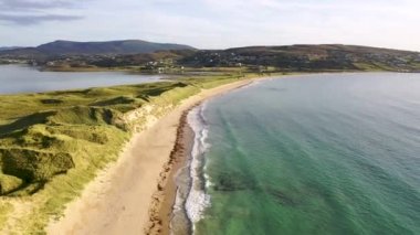 Machaire Rabhartaigh, Translation: Magheraroarty - Plane of the spring tideplane of roarty, Gaeltacht village and townland in north-west of County Donegal, Ireland
