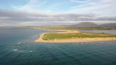 Machaire Rabhartaigh, Translation: Magheraroarty - Plane of the spring tideplane of roarty, Gaeltacht village and townland in north-west of County Donegal, Ireland