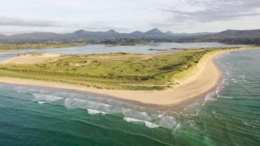 Machaire Rabhartaigh, Translation: Magheraroarty - Plane of the spring tideplane of roarty, Gaeltacht village and townland in north-west of County Donegal, Ireland