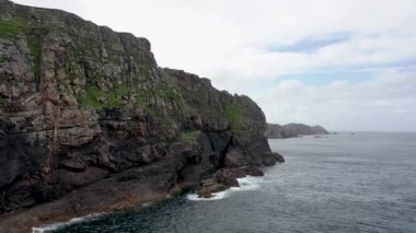 The cliffs and sea stacks at Port Challa on Tory Island, County Donegal, Ireland.