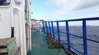 MAGHERAROARTY, COUNTY DONEGAL, IRELAND - AUGUST 25 2022 : The ferry is driving through rough sea between Magheraroarty and Tory Island.