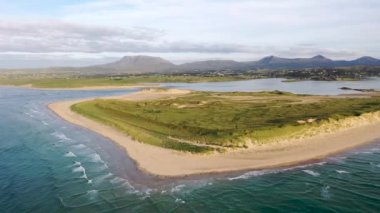 Machaire Rabhartaigh, Translation: Magheraroarty - Plane of the spring tideplane of roarty, Gaeltacht village and townland in north-west of County Donegal, Ireland