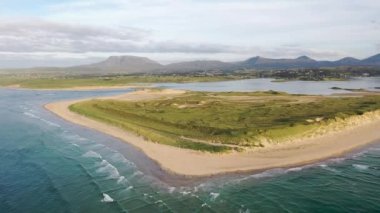 Machaire Rabhartaigh, Translation: Magheraroarty - Plane of the spring tideplane of roarty, Gaeltacht village and townland in north-west of County Donegal, Ireland