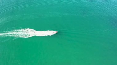 Aerial of jspeed boat driving on the Atlantic Ocean in Downings, County Donegal - Ireland.