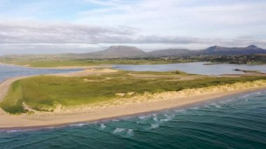 Machaire Rabhartaigh, Translation: Magheraroarty - Plane of the spring tideplane of roarty, Gaeltacht village and townland in north-west of County Donegal, Ireland