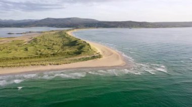 Machaire Rabhartaigh, Translation: Magheraroarty - Plane of the spring tideplane of roarty, Gaeltacht village and townland in north-west of County Donegal, Ireland