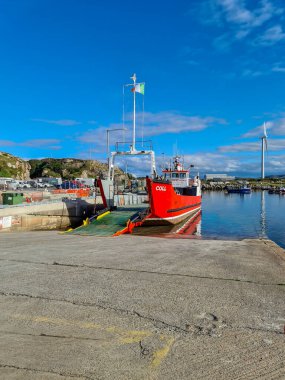 BURTONPORT, COUNTY DONEGAL, IRELAND - AUGUST 24, 2022 : Ferry leaving to Arranmore.