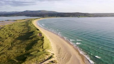 Machaire Rabhartaigh, Translation: Magheraroarty - Plane of the spring tideplane of roarty, Gaeltacht village and townland in north-west of County Donegal, Ireland