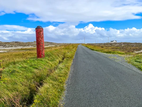 World War Torpedo standing next to road on Tory Island, County Donegal, Ireland.