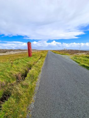 World War Torpedo standing next to road on Tory Island, County Donegal, Ireland.