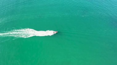 Aerial of jspeed boat driving on the Atlantic Ocean in Downings, County Donegal - Ireland.