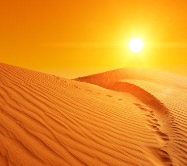 Sand dunes in Sahara clipart