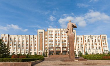 TIRASPOL, TRANSNISTRIA  OCTOBER 16, 2015: Transnistria parliament building and statue of Vladimir Leninr in Tiraspol, capital of the pro russian breakaway region of Trans Dniester in Moldova