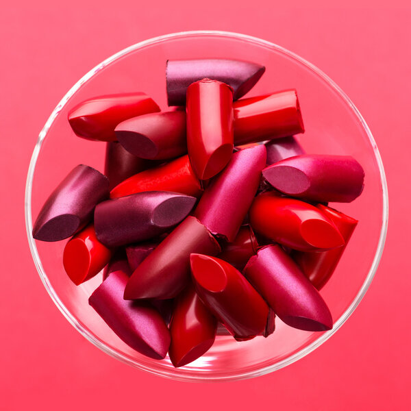 Variation color of lipstick in a glass