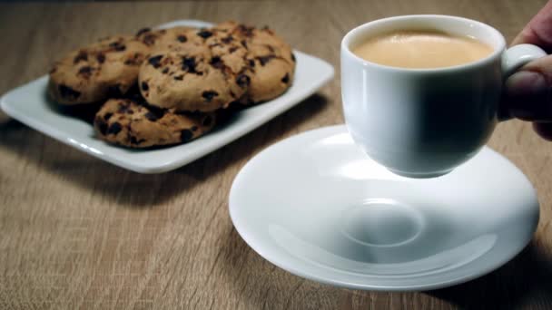 Hand Puts Coffee Espresso Table — Vídeo de stock