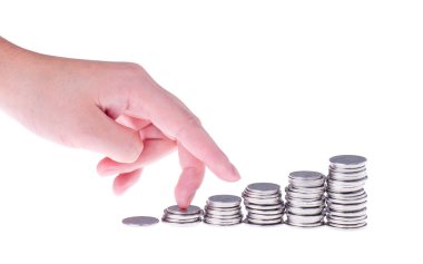 el ve büyüyen sikke yığını