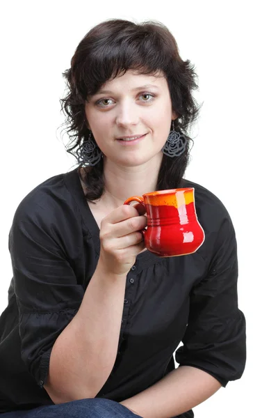 Woman holding a red cup, isolated — Stock Photo, Image