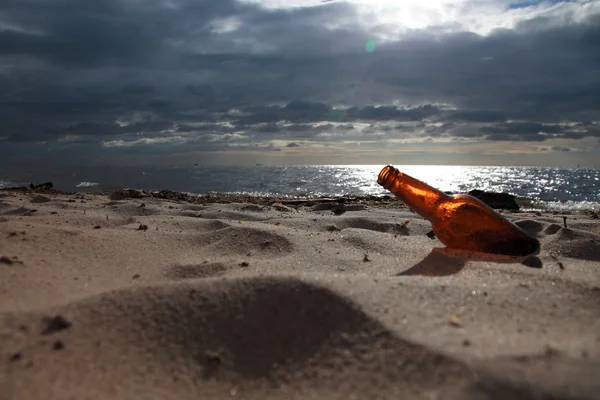 Bottle on beach sea and sky — Stock Photo, Image