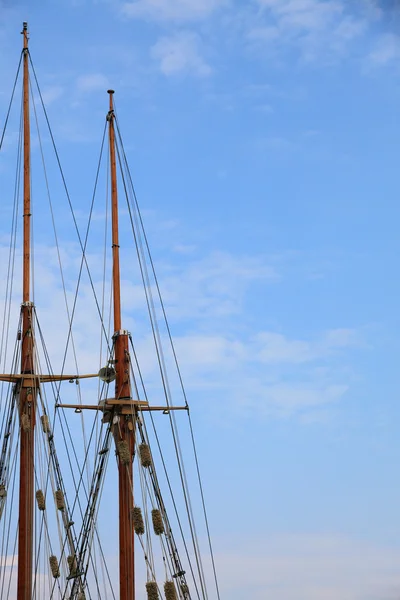 Masts rigging of sailing vessels blue sky — Stock Photo, Image