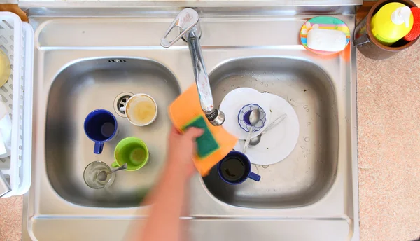 Washing-up bowl in kitchen cup — Stock Photo, Image