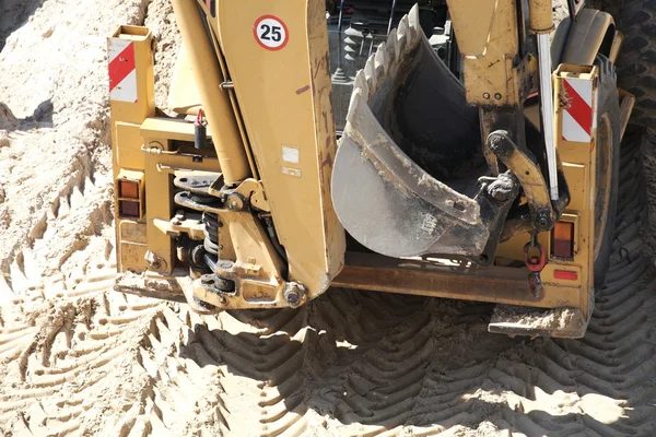 Yellow excavator construction site — Stock Photo, Image