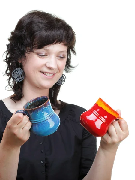 Woman holding a red and blue cup, isolated Royalty Free Stock Images