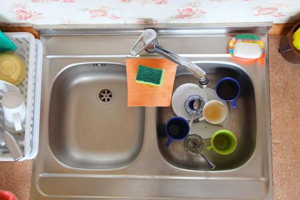 Washing-up bowl in kitchen cup — Stock Photo, Image