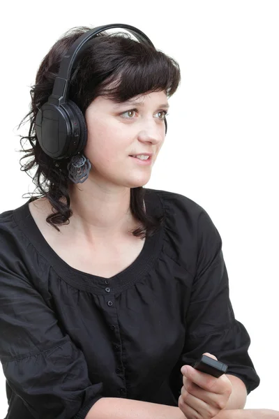 Mulher sorridente com fones de ouvido — Fotografia de Stock