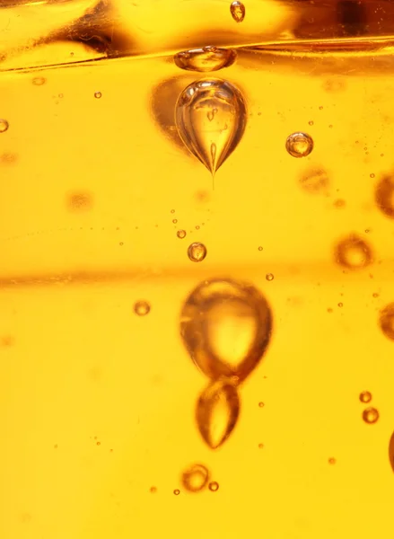 Soap bubbles orange liquid — Stock Photo, Image