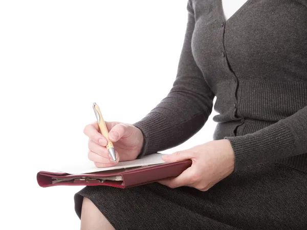 Женщина писать ручкой на бумаге изолированы — стоковое фото