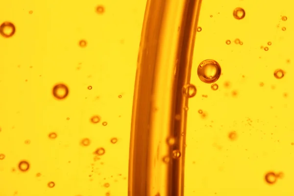 Soap bubbles orange liquid — Stock Photo, Image