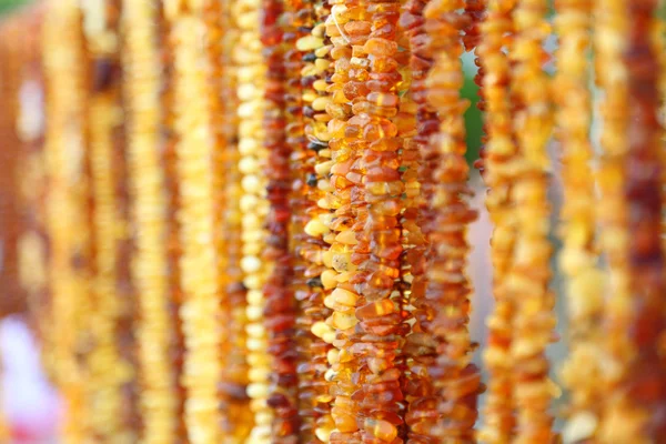 Tekstur latar belakang kalung Amber — Stok Foto