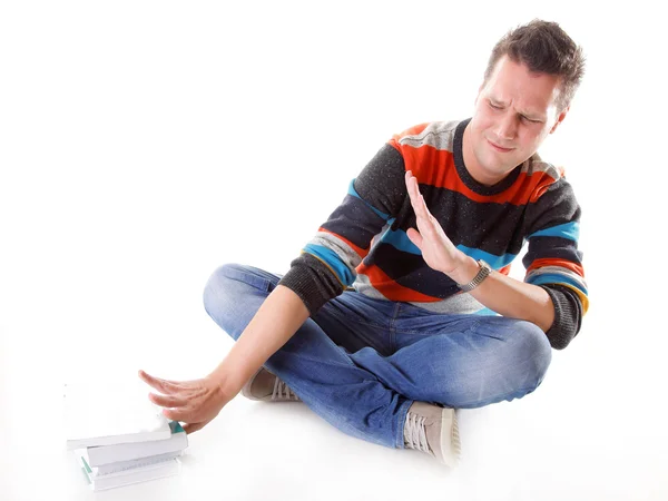 Tired college student with stack of books isolated — Stock Photo, Image