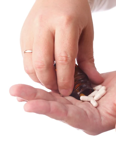 Pills in man hand — Stock Photo, Image