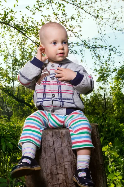 Boy on stump — Stock Photo, Image