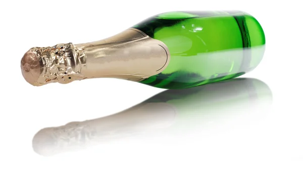 Een fles champagne op geïsoleerde — Stockfoto