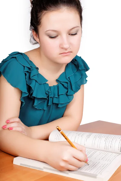 Pretty teen schoolgirl studying for school — Stock Photo, Image