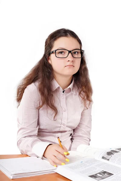 Brünette schulmädchen tut lessons — Stockfoto