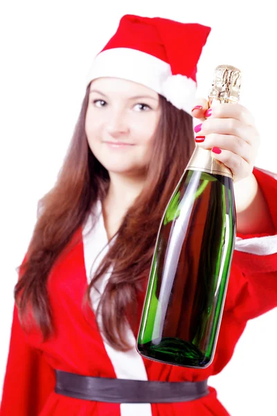 Pretty young girl dressed as Santa offers champagne — Stock Photo, Image
